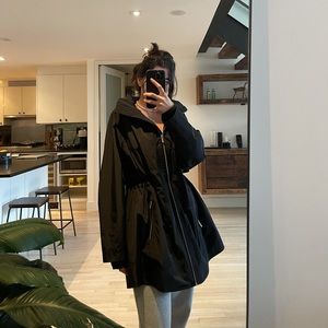 Rain coat - in black. CK